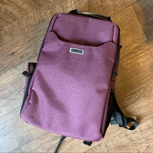Flyleaf purple USB camera bag backpack with charging cord